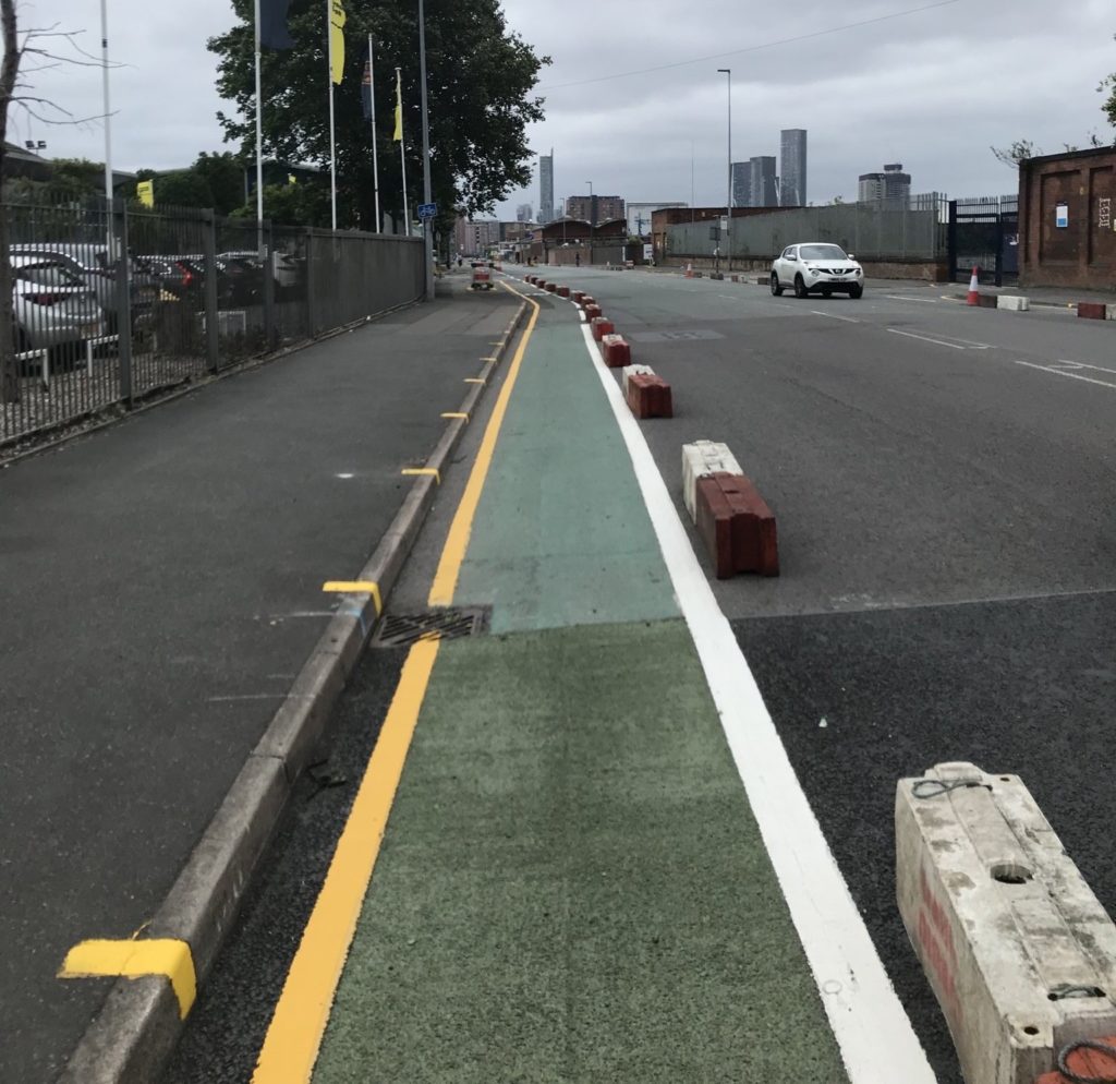 New pop-up cycle lane/expanded pavement on Liverpool Street in Salford