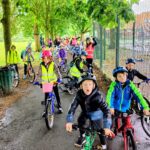 Picture of a group of children on bikes taking part in a bike bus