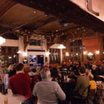 Picure of room at Station South Cafe full of people attending the 2025 Active Travel Awards