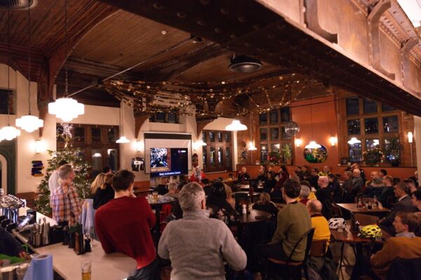 Picure of room at Station South Cafe full of people attending the 2025 Active Travel Awards